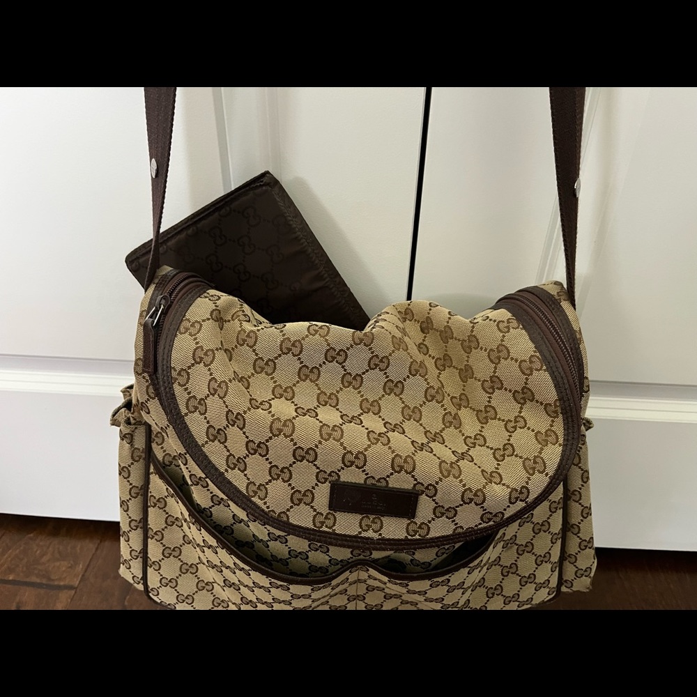 Gucci diaper bag with Gucci changing pad